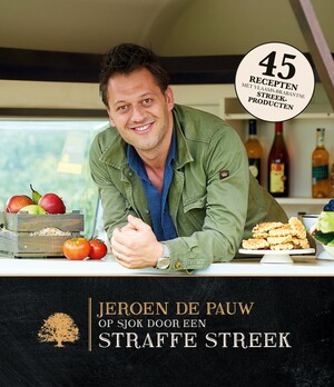 Jeroen staat in een caravan met een mooie glimlach